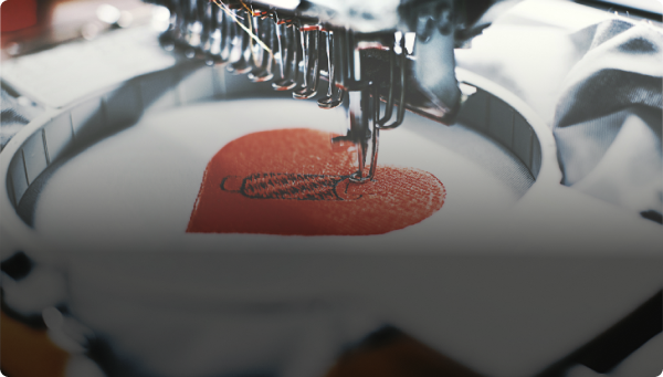 Embroidery of heart with initials